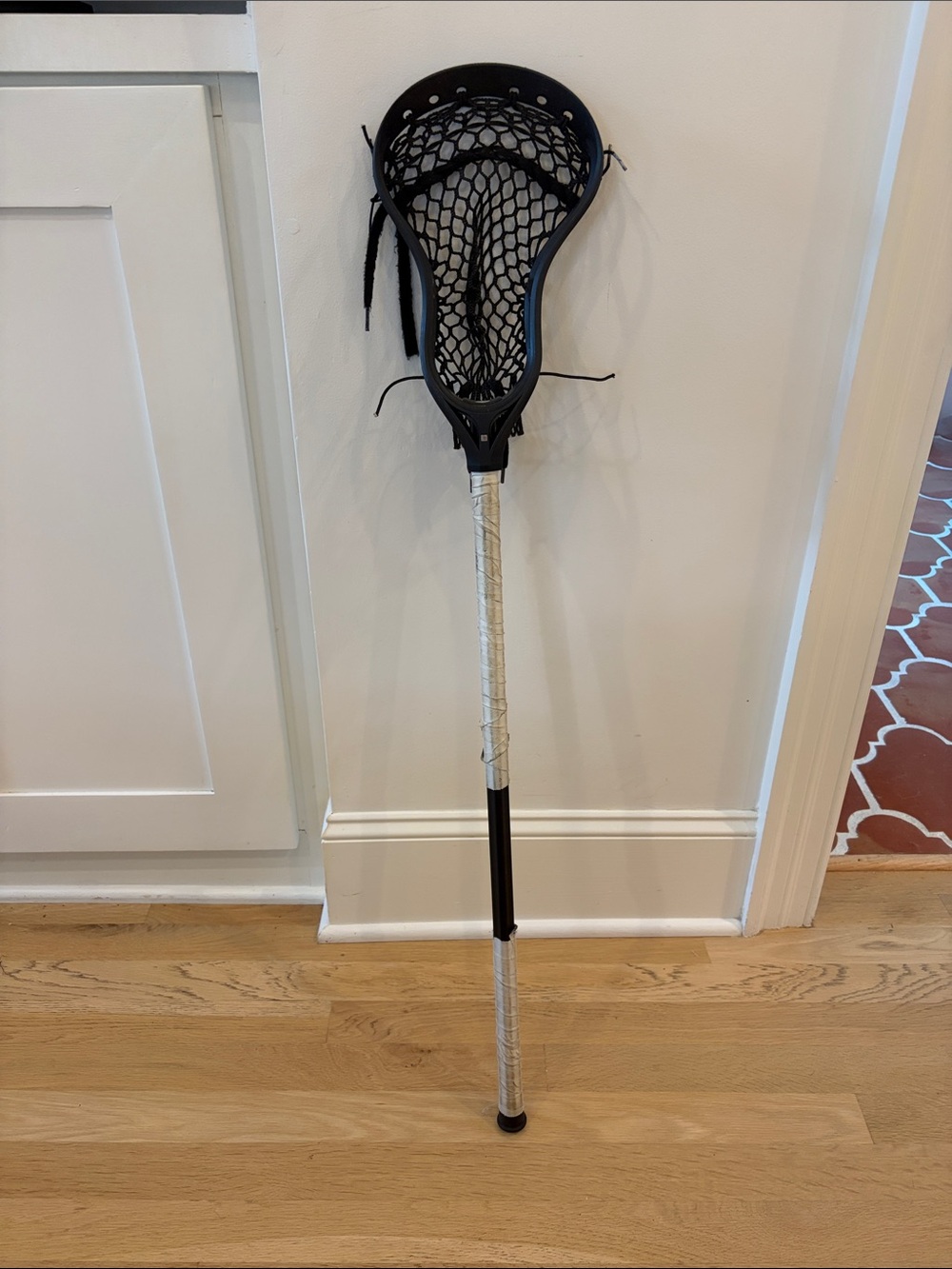 Black Lacrosse Stick with Silver Shaft